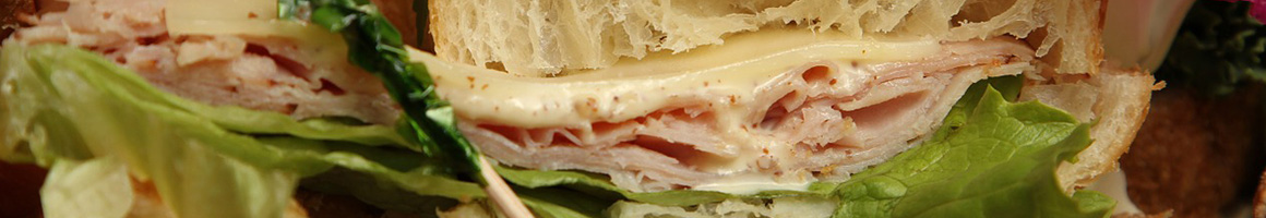 Eating Sandwich Cafe at Sonja's Cafe restaurant in Rainier, WA.